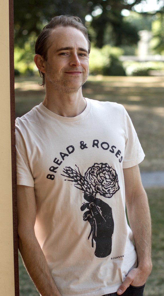 Author photo of Ryler Dustin in a T-shirt.